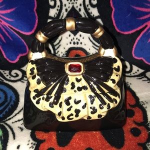 David’s Cookies black cream gold purse container